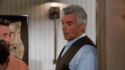 Man And Woman Standing Next To Each Other GIF