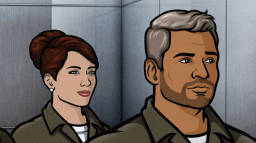 Man And Woman Standing Next To Each Other In Room GIF