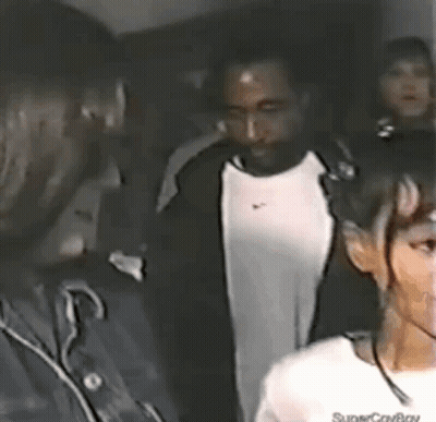 Man And Woman Standing Next To Each Other GIF