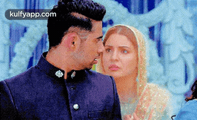 Man And Woman Standing Next To Each Other GIF