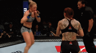 Man And Woman Standing Next To Each Other GIF