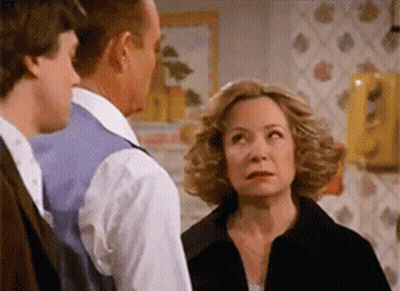Man And Woman Standing Next To Each Other GIF