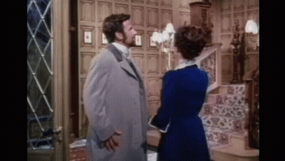 Man And Woman Standing Next To Each Other GIF