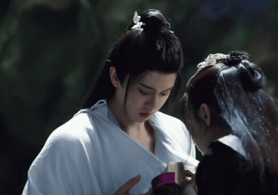 Man And Woman Standing Next To Each Other GIF