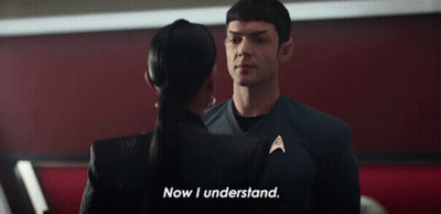 Man And Woman Standing Next To Each Other GIF