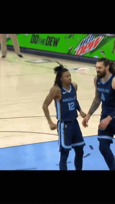 Man And Woman Standing Next To Each Other GIF