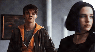 Man And Woman Standing Next To Each Other GIF