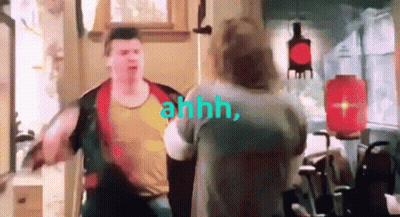 Man And Woman Standing Next To Each Other Saying Ahhh GIF