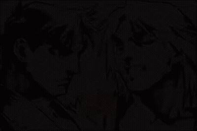 Man And Woman Standing Next To Each Other Saying Vs GIF