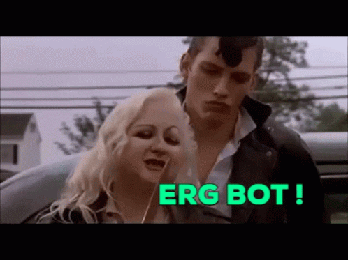Man And Woman Standing Next To Each Other With Words Erg Bot GIF