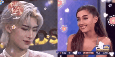 Man And Woman Standing Next To Golden Disc Awards GIF