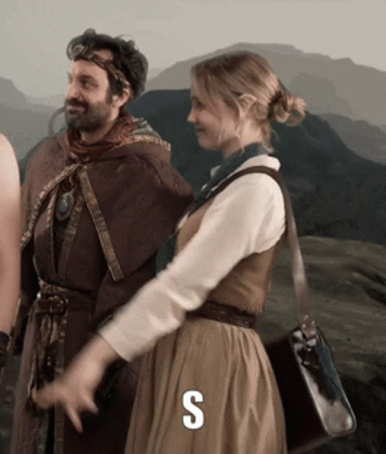 Man And Woman Standing Next To S GIF
