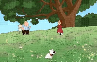Man And Woman Standing Next To Tree GIF