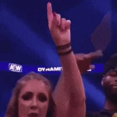Man And Woman Standing Next To Woman In Pittsburgh Shirt GIF