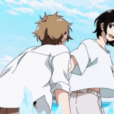 Man And Woman Standing On Beach GIF
