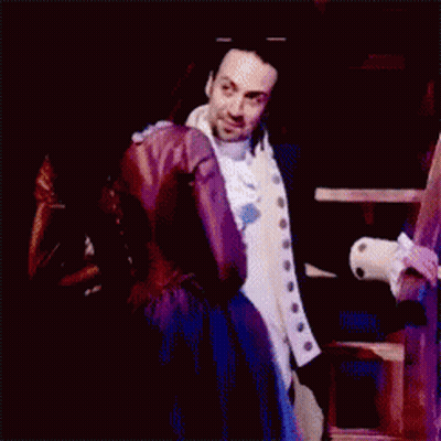Man And Woman Standing On Stage GIF