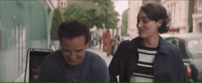 Man And Woman Standing On Street GIF