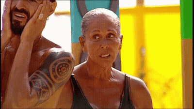 Man And Woman Standing On Yellow Background GIF