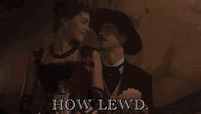 Man And Woman Standing Saying How Lewd GIF