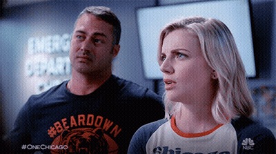 Man And Woman Standing Together With Beardown Shirt GIF