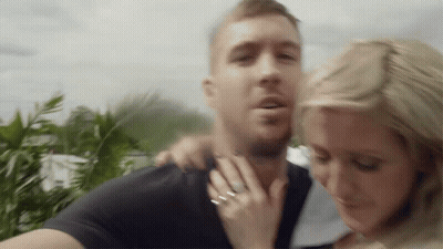 Man And Woman Standing Together With Wedding Ring GIF