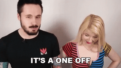 Man And Woman Standing Together Woman In Colorful Striped Shirt GIF