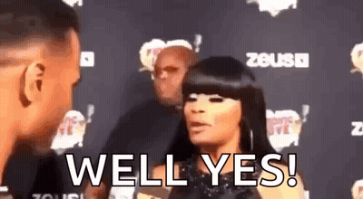 Man And Woman Standing Together Woman Saying Well Yes GIF