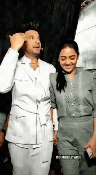 Man And Woman Standing Together Woman Singing GIF