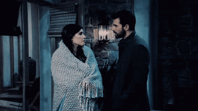 Man And Woman Standing Together Woman Wrapped In Blanket GIF