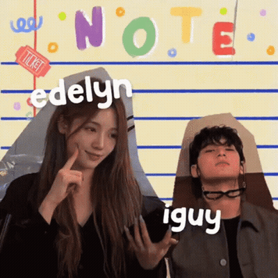 Man and Woman Standing With Note Behind Them