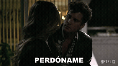 Man And Woman Standing With Perdoname GIF