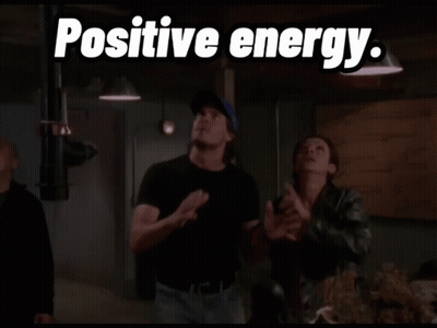 Man And Woman Standing With Positive Energy GIF