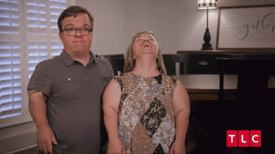 Man And Woman Standing With TLC GIF
