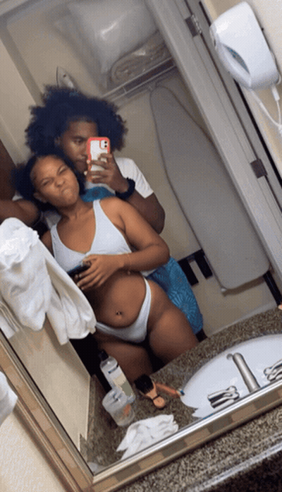 Man And Woman Taking Bathroom Selfie GIF
