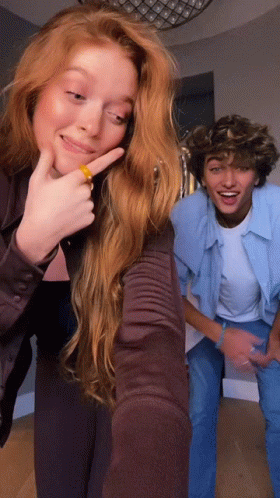 Man And Woman Taking Selfie GIF