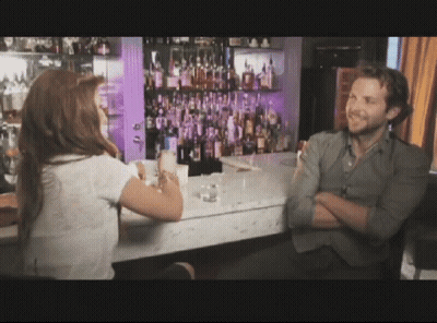 Man And Woman Talking At Bar GIF