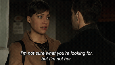 Man And Woman Talking I'm Not Sure What You're Looking GIF