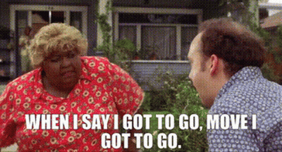 Man And Woman Talking In Front Of House GIF
