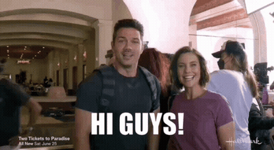 Man And Woman Talking In Hallway GIF