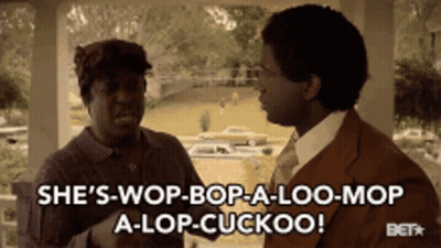 Man And Woman Talking On Porch Saying She's Wop Bop A Loo Mop GIF