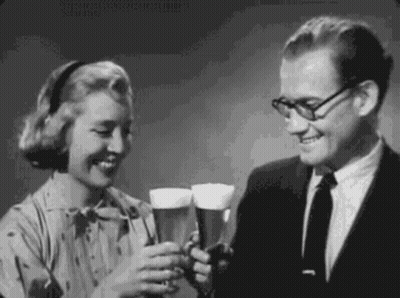 Man And Woman Toasting With Beer GIF