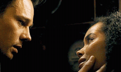 Man And Woman Touching Each Other's Faces GIF