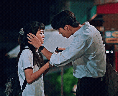 Man And Woman Touching Faces In Front Of Burger King Sign GIF
