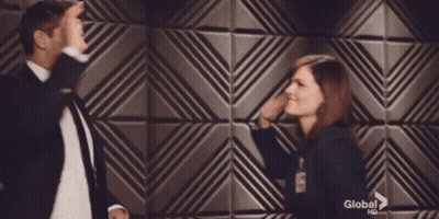 Man And Woman Touching Faces GIF