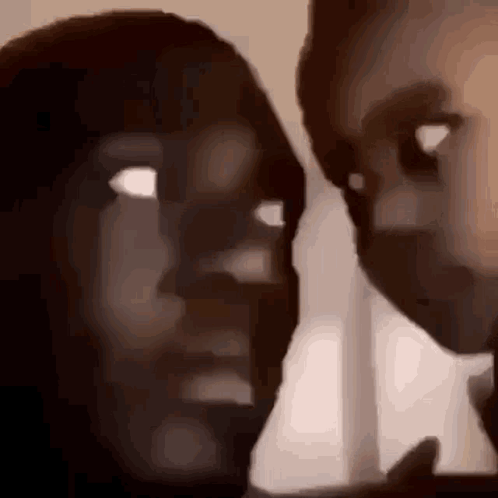 Man And Woman Touching Faces GIF