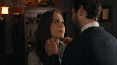 Man And Woman Touching Faces GIF
