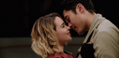 Man And Woman Touching Noses And Smiling GIF