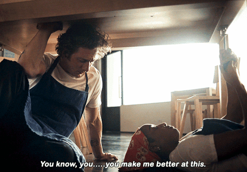 Man And Woman Under Table GIF