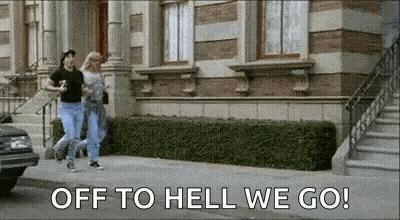 Man And Woman Walking Down Street GIF