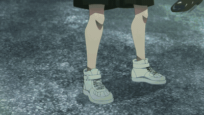 Man And Woman Walking Down Street At Night GIF